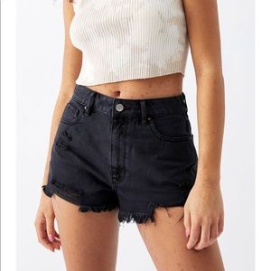 Black denim shorts. High waisted